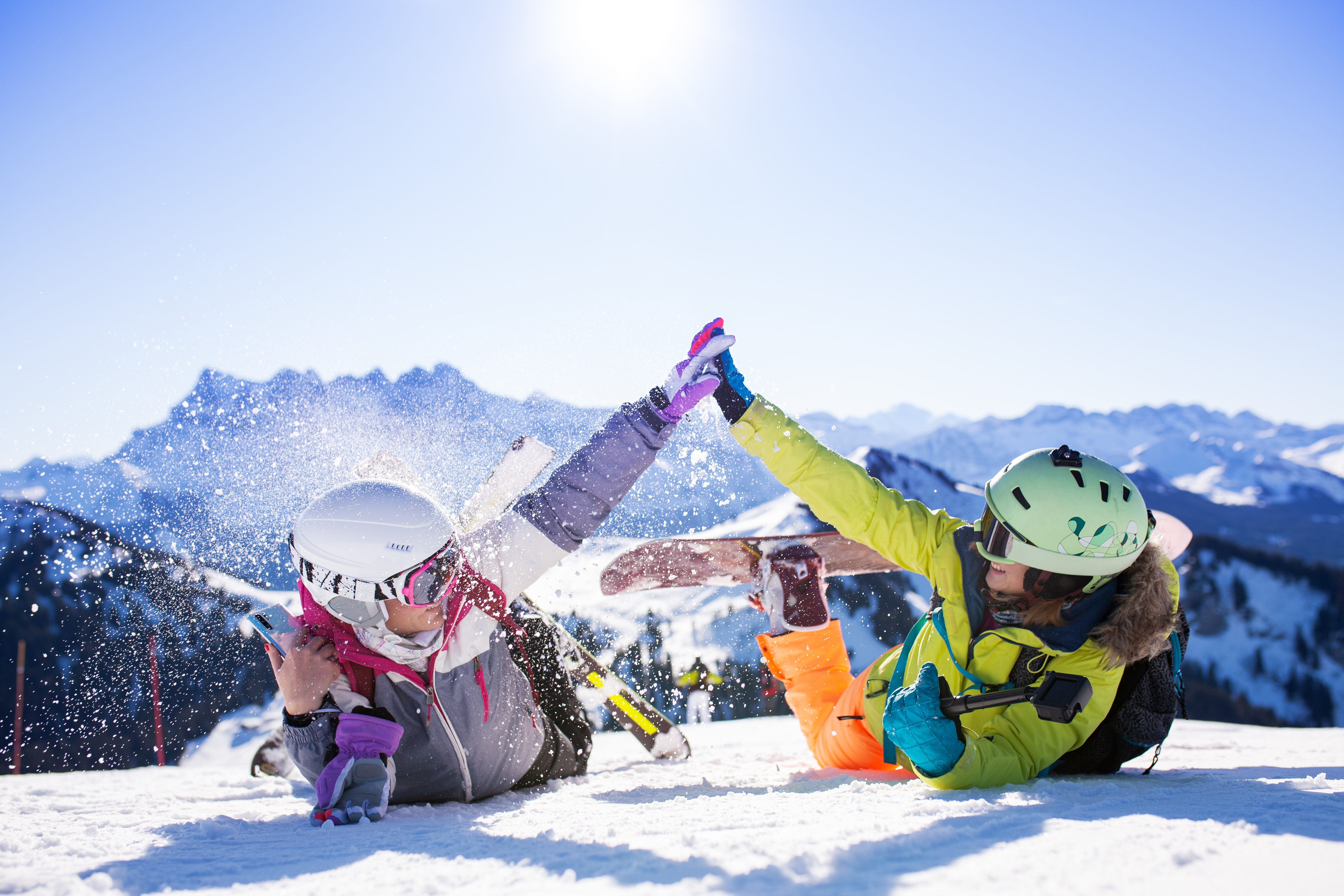 Two women skiing at the top of a mountain — If you expereince altitude sickness, contact Vida-Flo Decatur 
