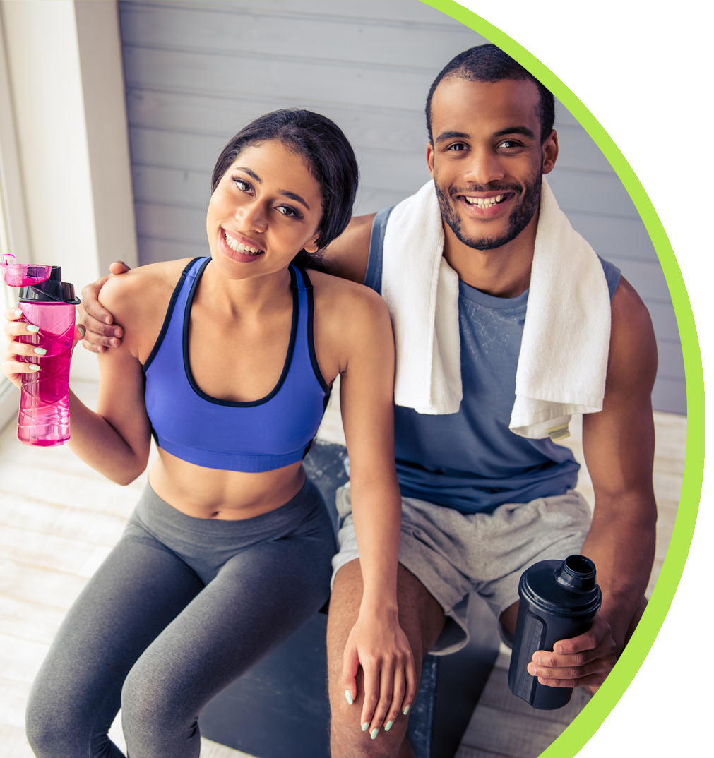 Two people in exercise clothes - learn how IV vitamin infusions in Wilmington, NC can benefit you with Vida-Flo.
