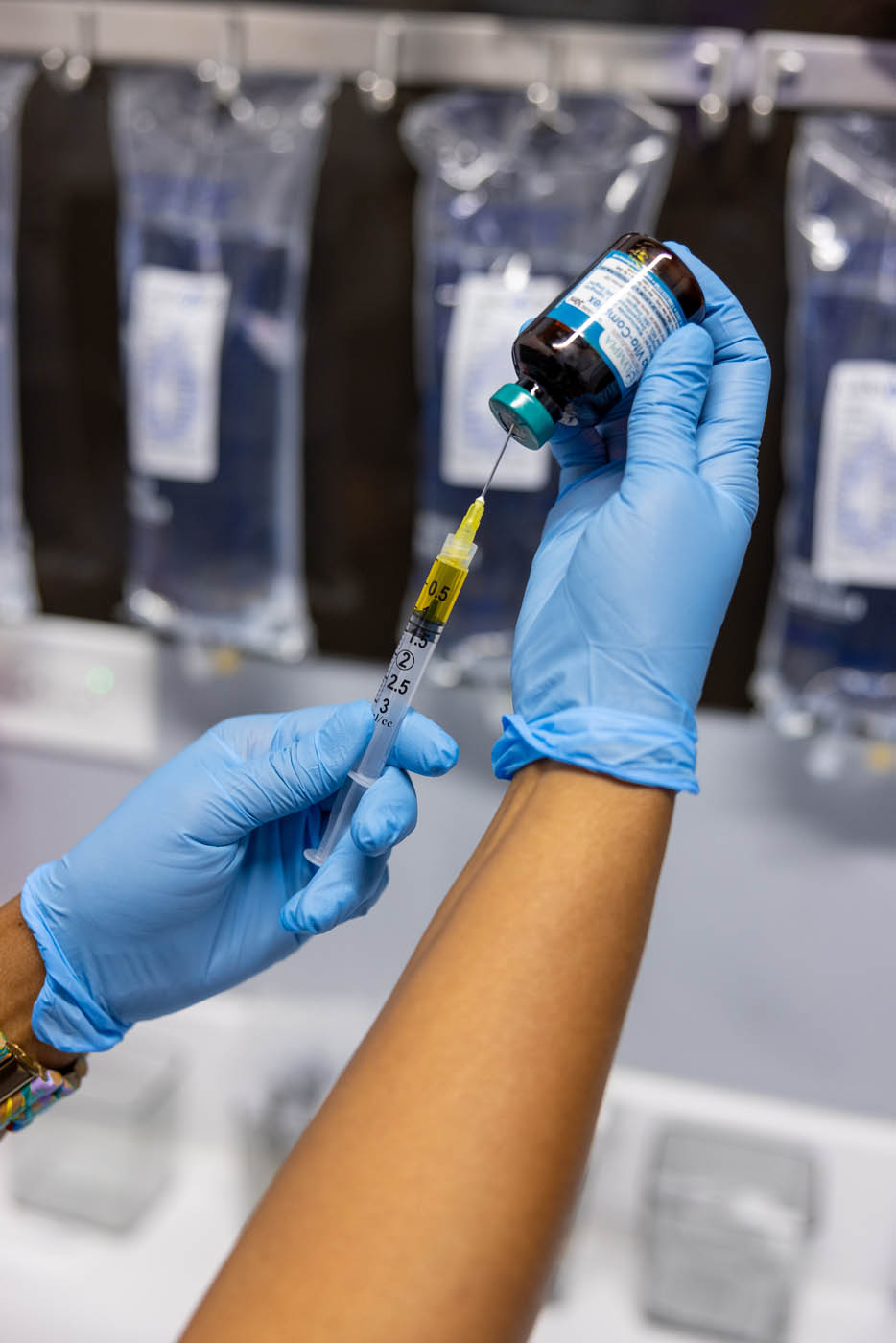 A Vida-Flo registered nurse providing expert infusion services for an IV hydration therapy.