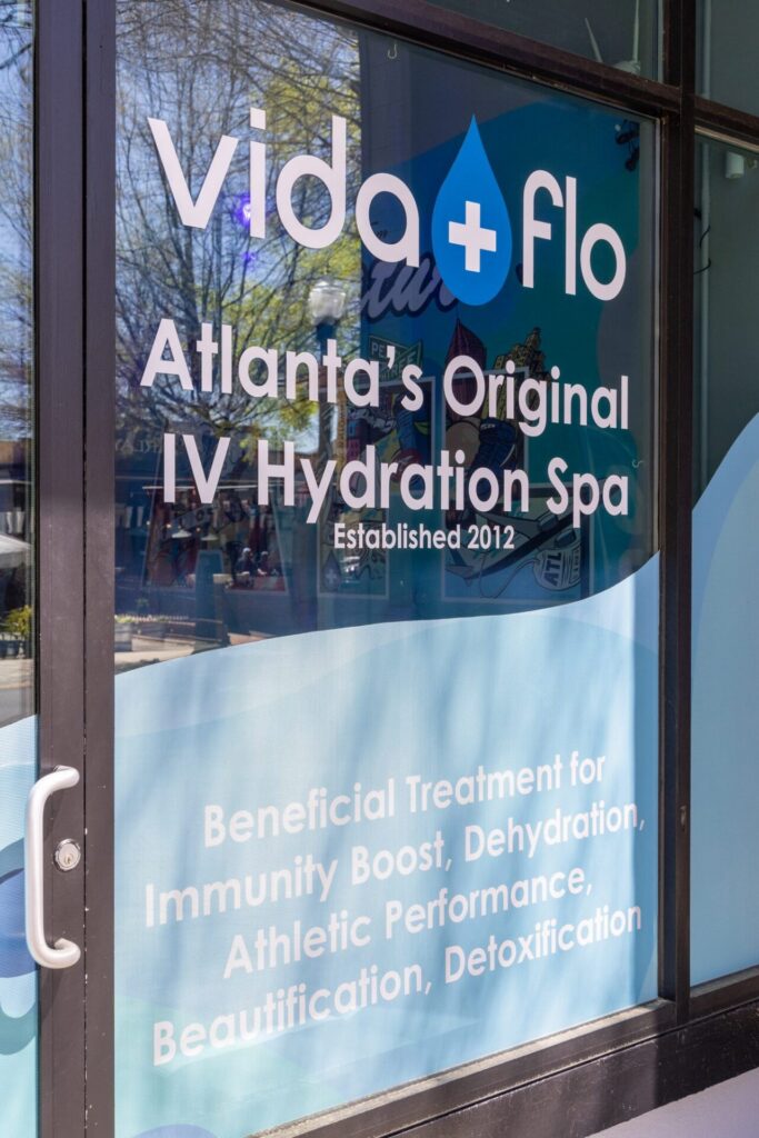 Vida-Flo window reading Atlanta's Original IV Hydration Spa, established 2012
