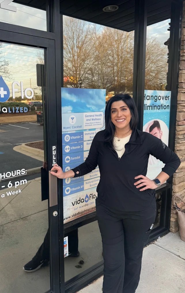 Vida-Flo Johns Creek team member at the clinic entrance